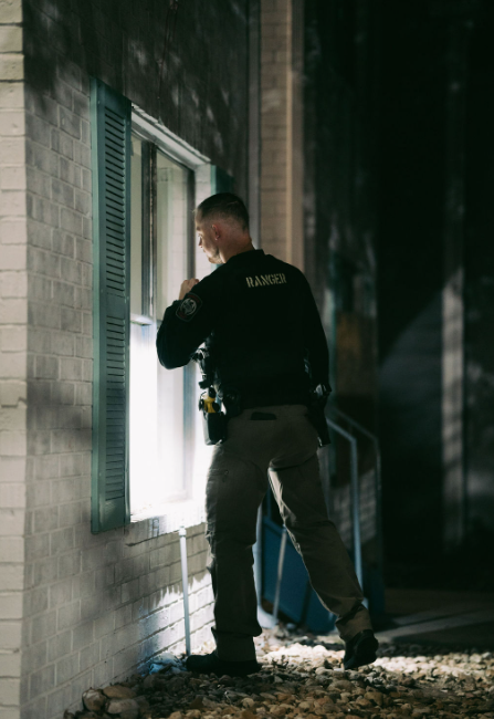Ranger security officer conducting an overnight property security check